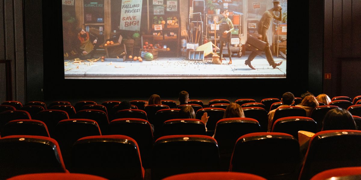 Une salle de cinéma, pour symboliser le 7e art