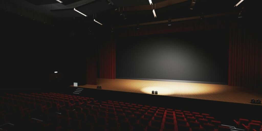 Salle de théâtre faiblement éclairée